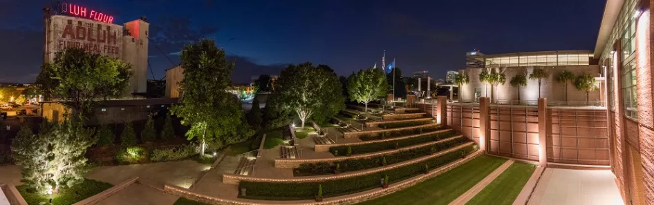 Overlooking the garden area at night with Adluh in the background.